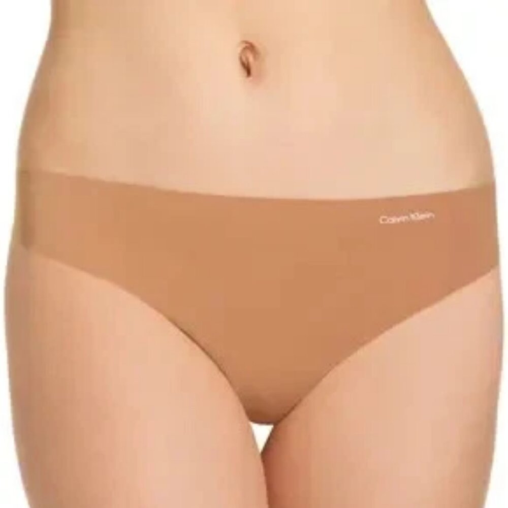 Calvin Klein Women's Invisibles Thong Panty Underwear, Bronzed Nude, Large